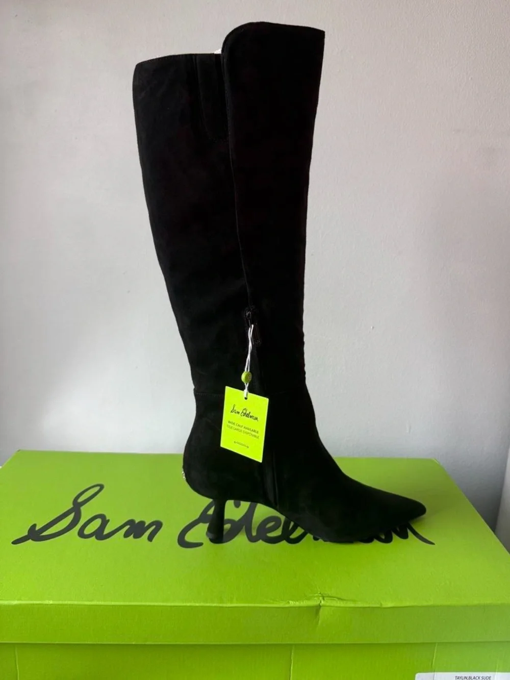 Sam Edelman tall over